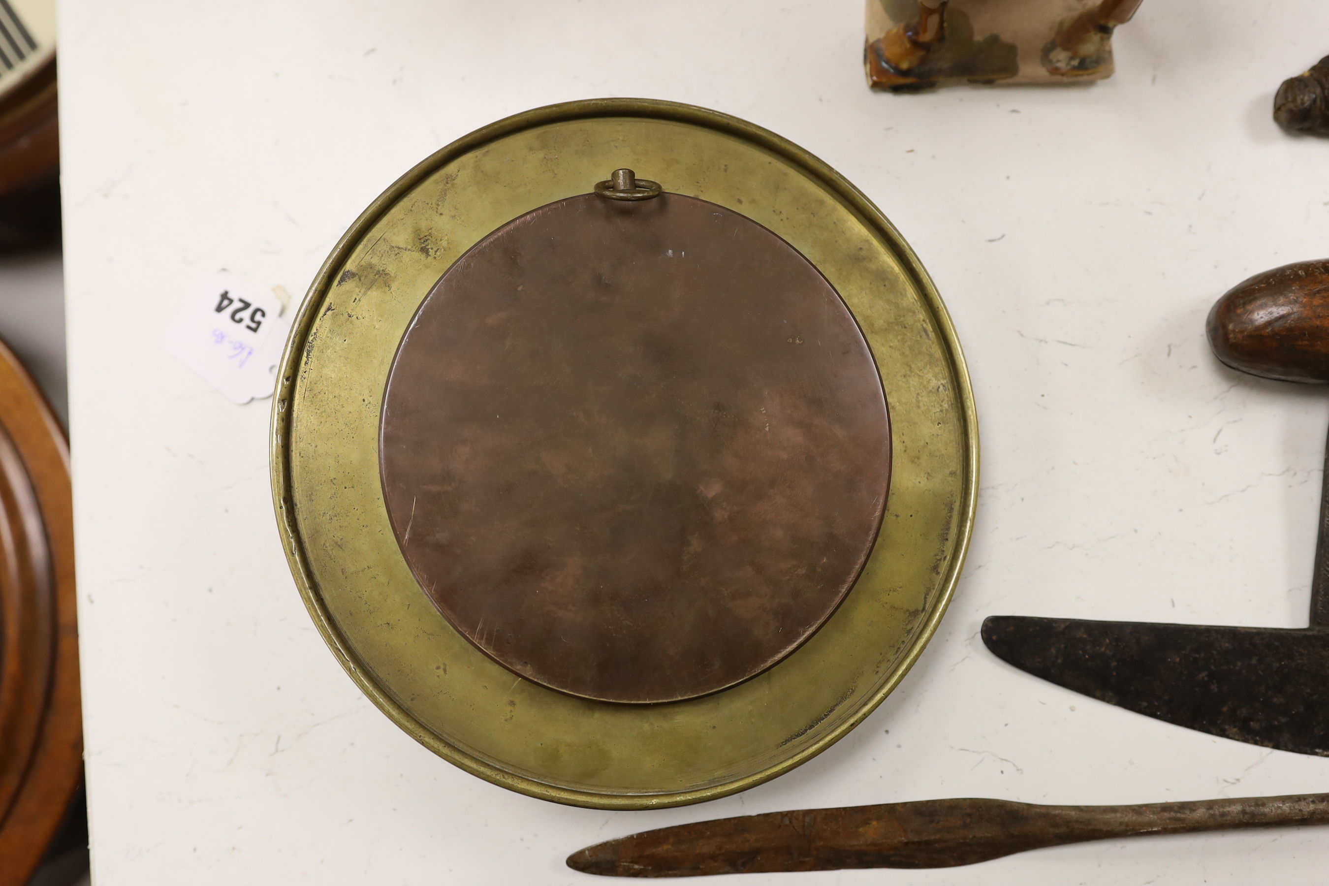 A brass porthole clock with Jaeger Le Coutre dial, total diameter 24cm